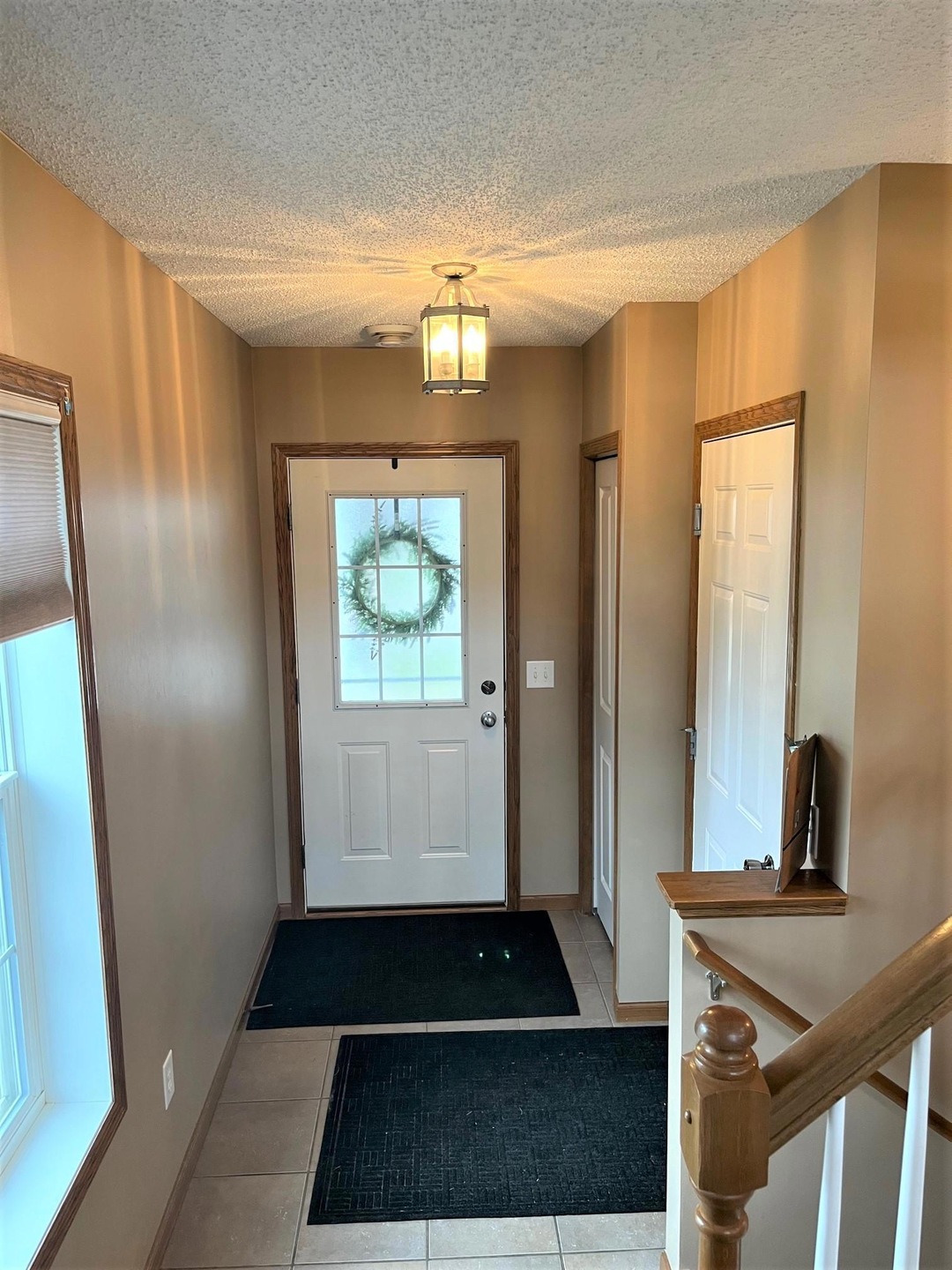 Welcome! Front entry area with closet and access to garage.