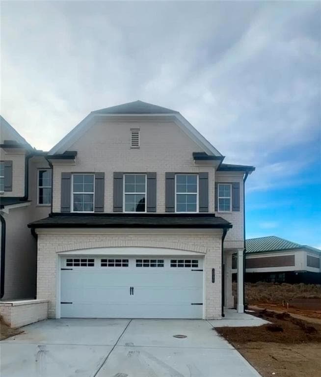 View of front of home with a garage
