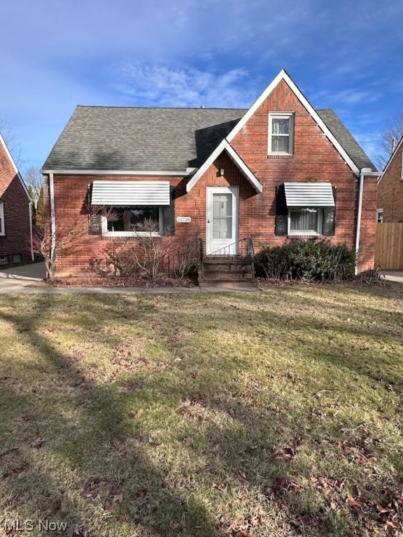 View of front of home featuring a front lawn