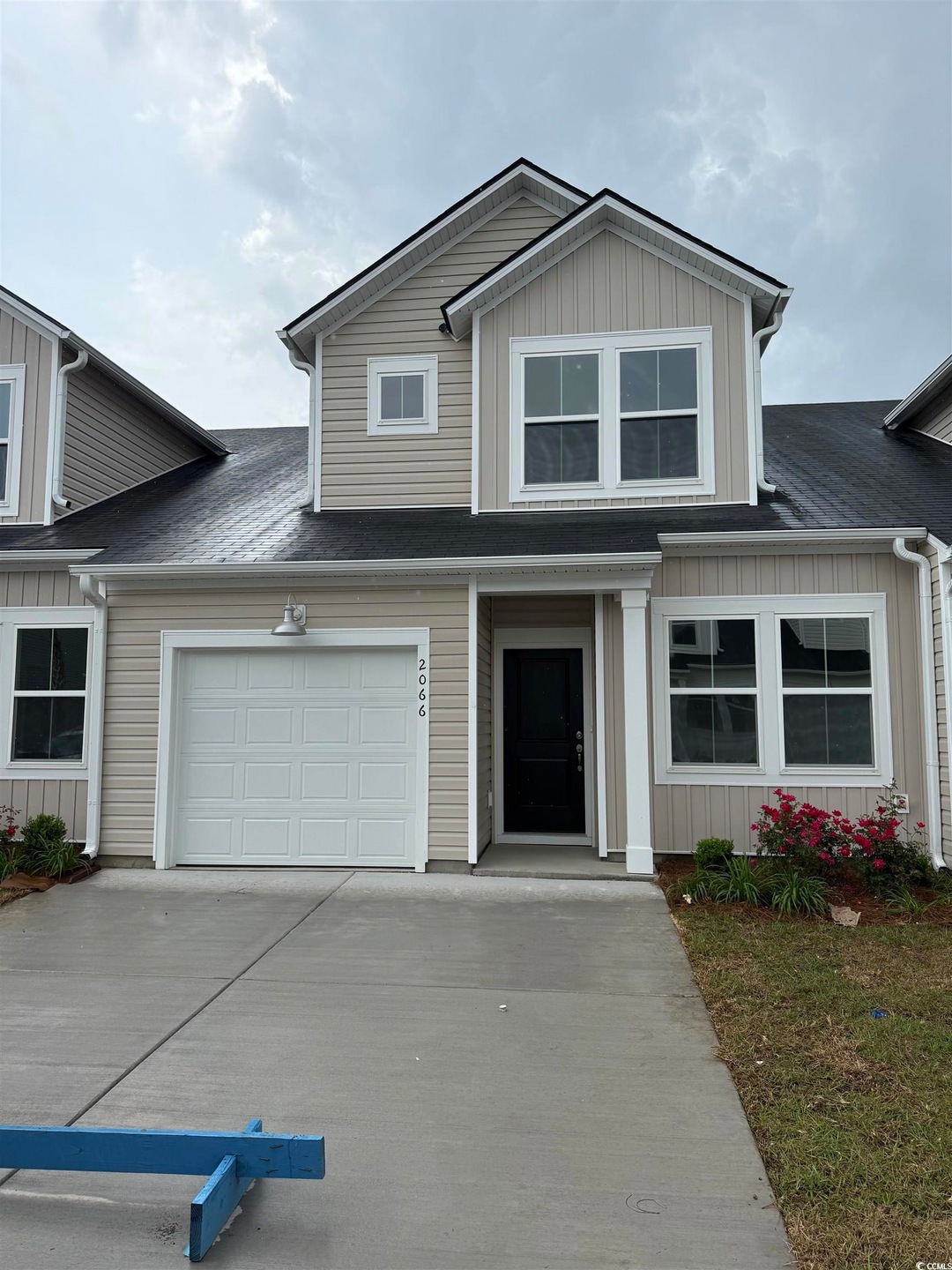 View of front of home with board and batten siding