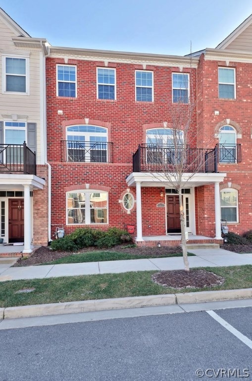 Front view, full brick with covered porch