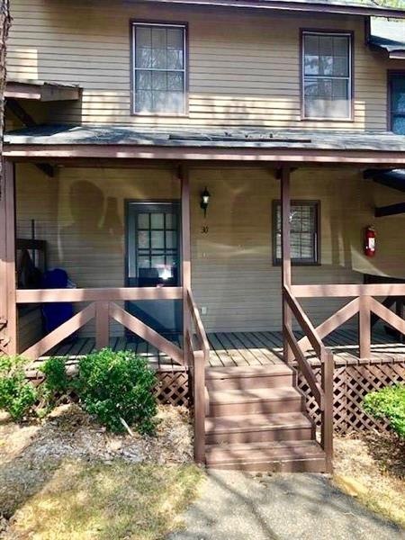 Rocking chair front porch. Steps away to parking i