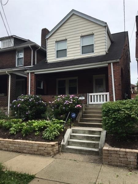 Front of the house with spring & summer blooms!