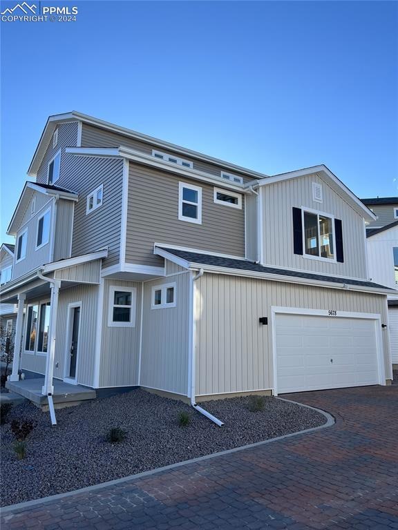View of front of home with a garage