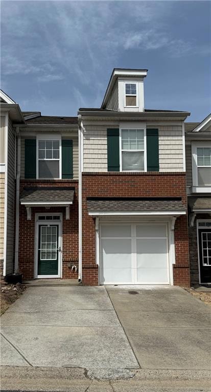 Townhome / multi-family property featuring concret