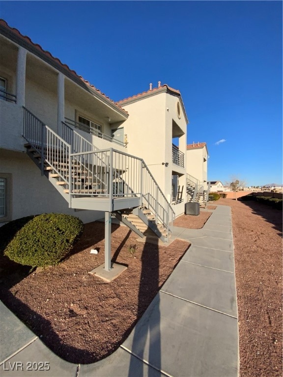View of home's community with stairway