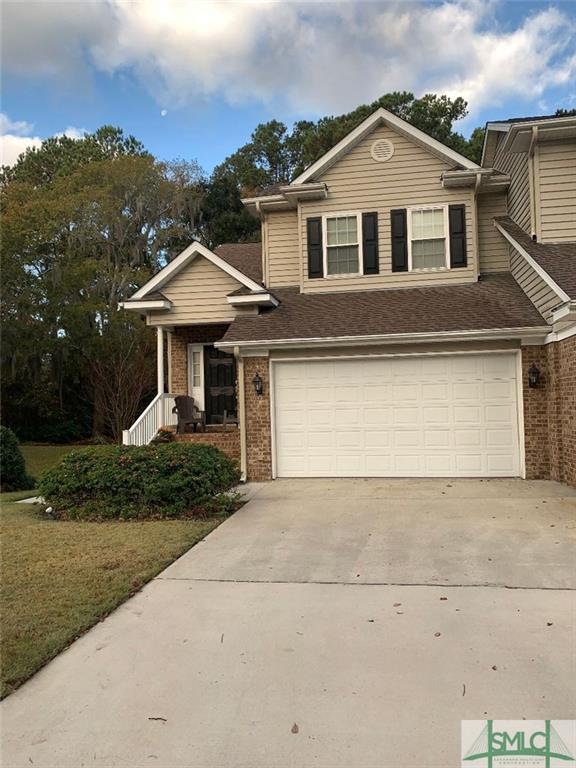 Beautiful brick front townhome with generous side 