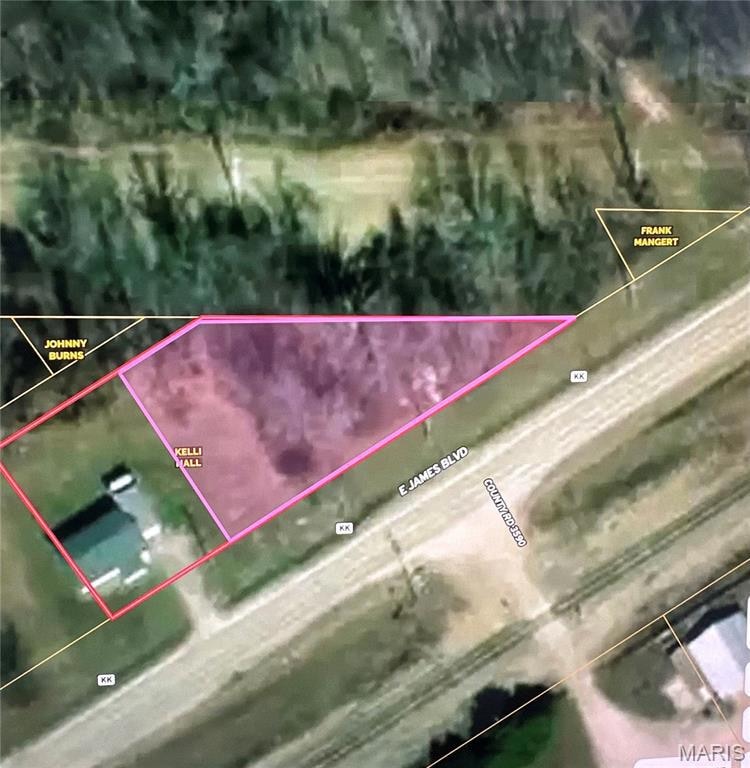 Aerial overview of property's location with property parcel outlined