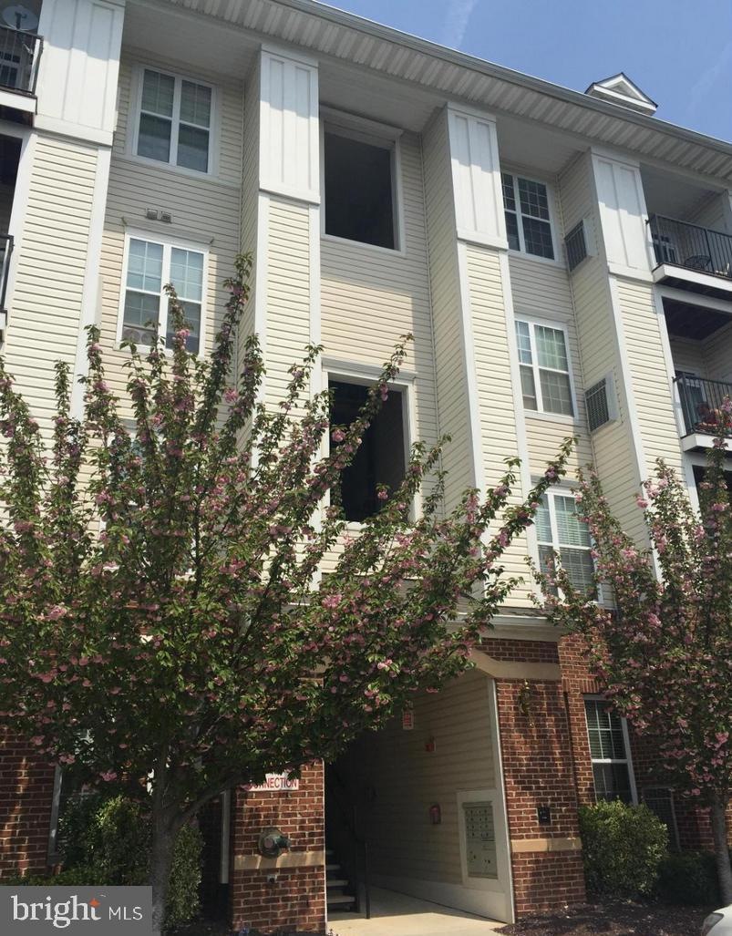 21216 Mcfadden Square unit 407, Sterling, VA 20165 - photo 1