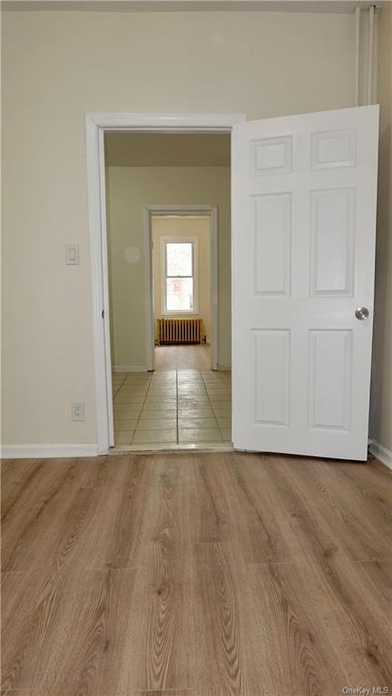 Family room/ office space leading to kitchen and bedroom 1