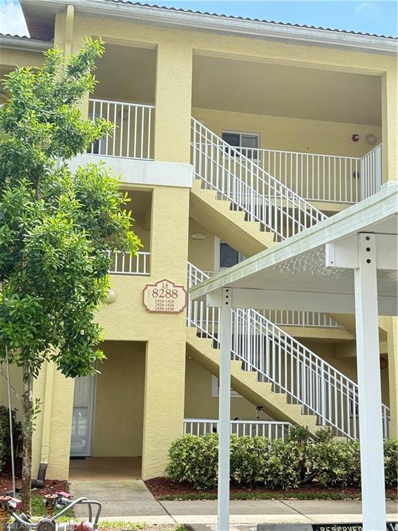 View of building exterior featuring stairs