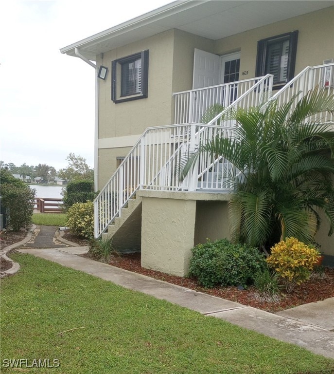 View of home's exterior featuring a yard