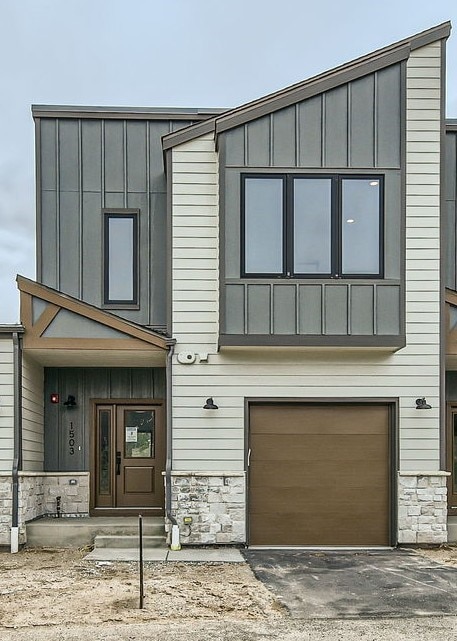 View of front of home with board and batten siding