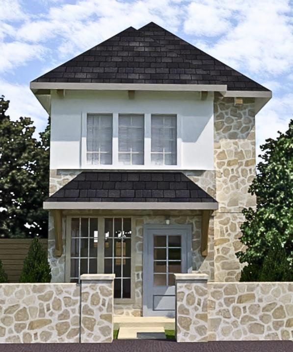 View of front of house featuring stone siding