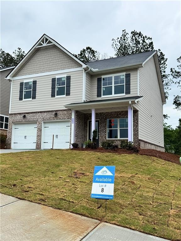 Showcasing board and batten siding, a welcoming fr