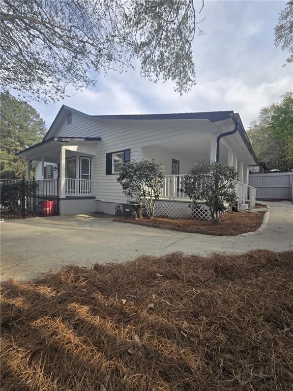 View of front of home featuring covered porch and 