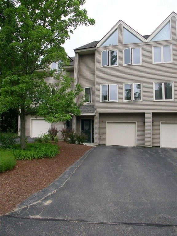 Front view and driveway.