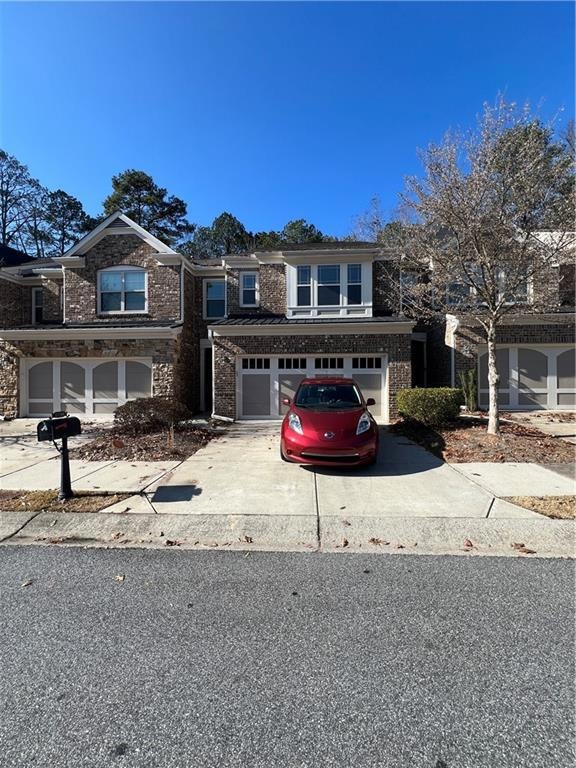 View of front property featuring a garage