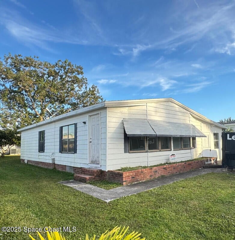 1973 Mango St NE, Palm Bay, FL 32905 - photo 1