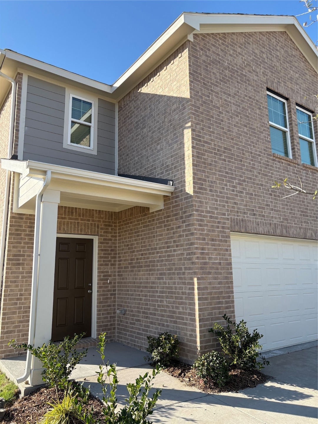 View of front of home with brick siding