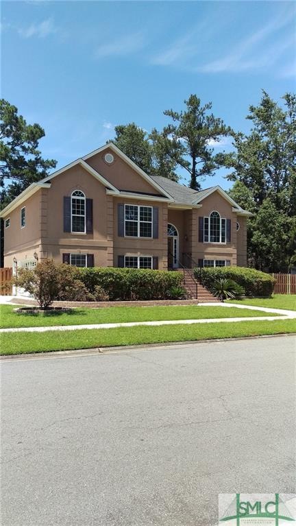 Beautiful hard coat stucco home on large corner lo