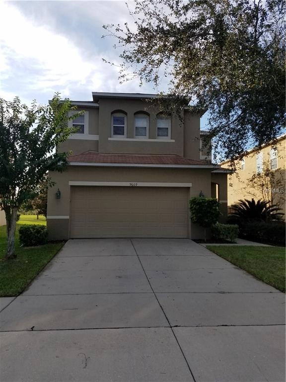 9609 Simeon Dr, Land O Lakes, FL 34638 - photo 1