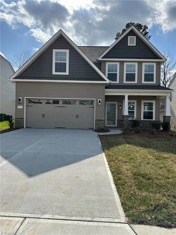 Beautiful Stone wainscotting and long drive