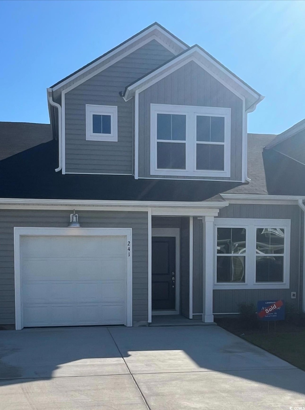 View of front of home featuring a garage