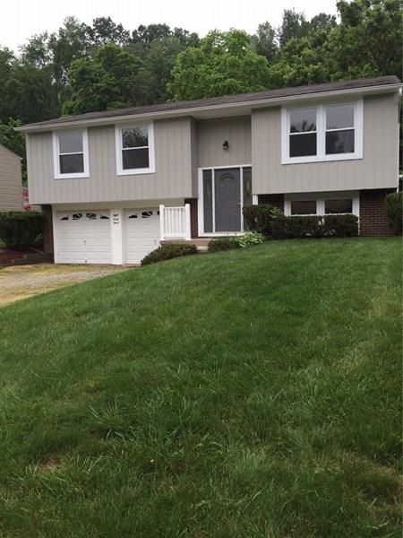 Maintenance free aluminum and brick split level wi