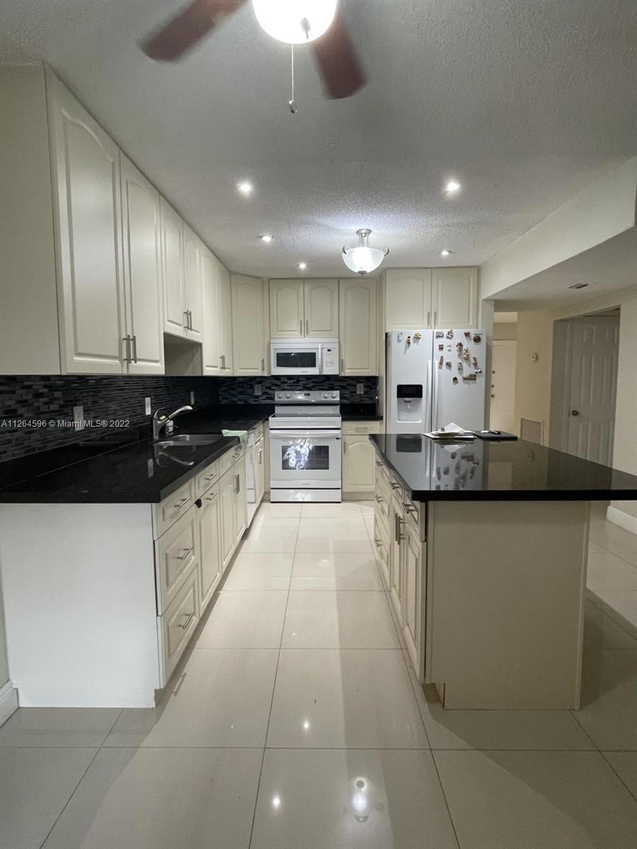 7595 NW 75th Ave, Tamarac, FL 33321 - photo 1