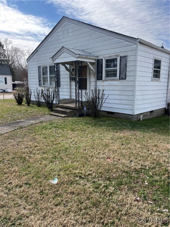 View of front of home featuring crawl space and a