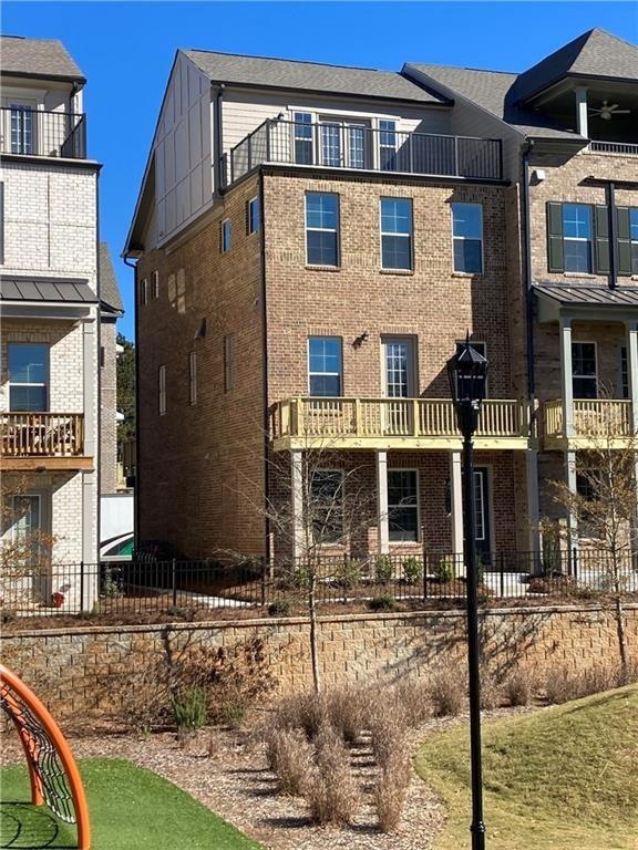 View of exterior from green space