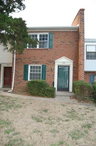 Brick front unit with side walk entry.