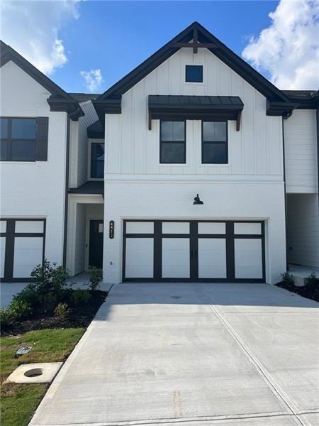 View of front of home with a garage