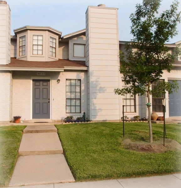 Landscaped front entrance.