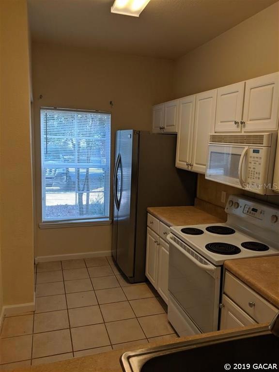 5065 SW 46th St unit 106, Gainesville, FL 32608 - photo 1