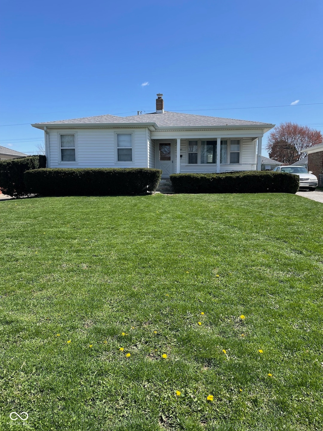 View of front of home with front yard