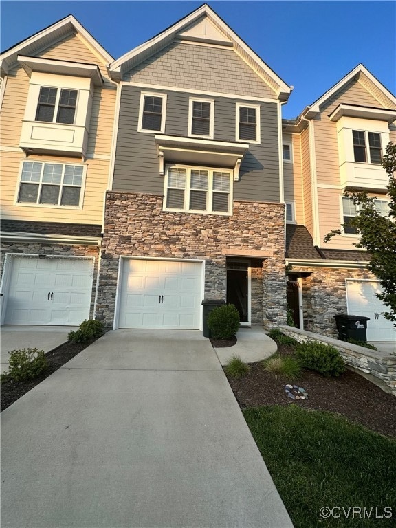 View of front of home featuring a garage