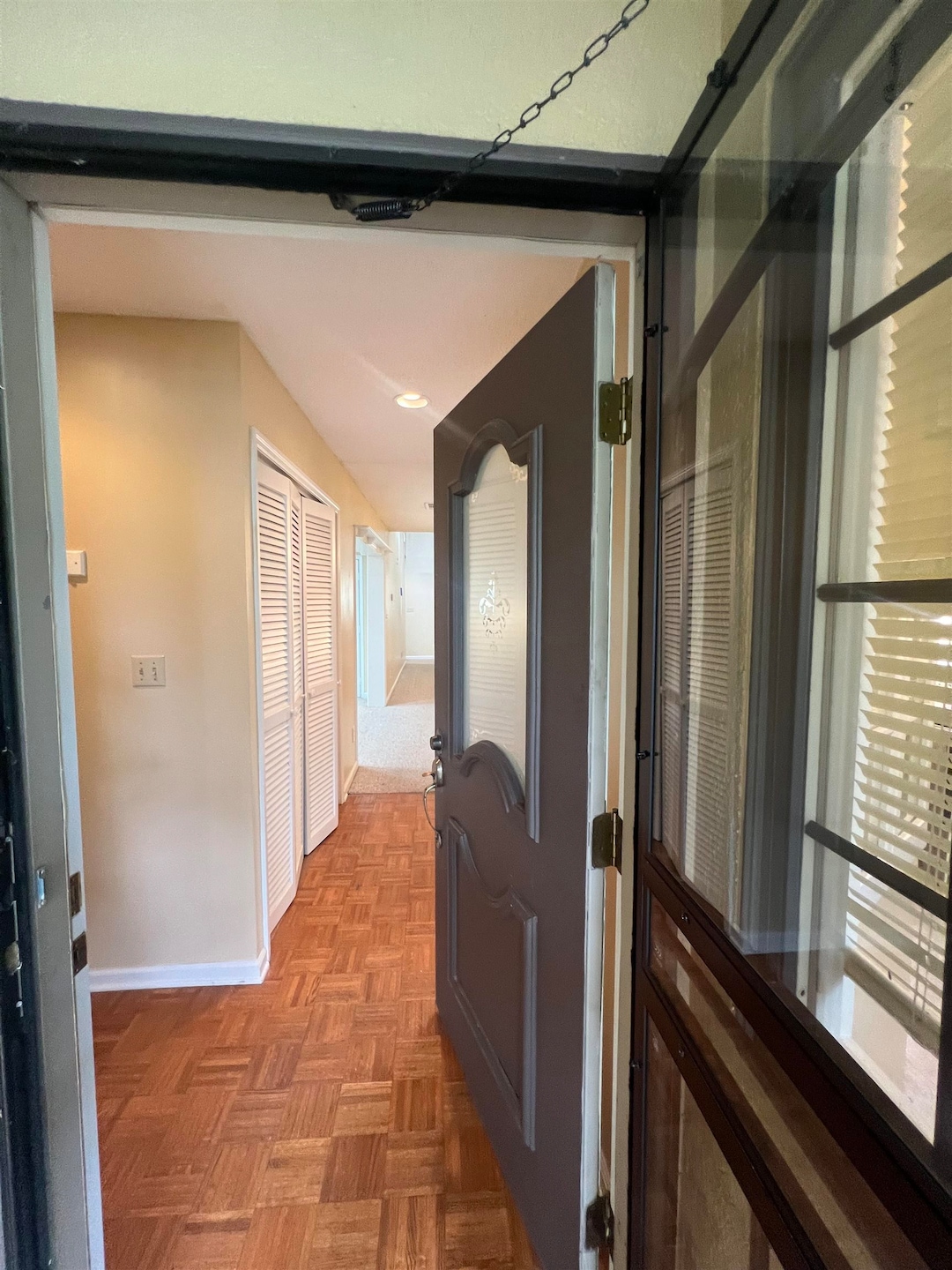 Hall with baseboards and recessed lighting