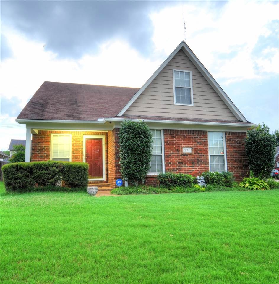 Corner lot! Easy to maintain brick and freshly pai