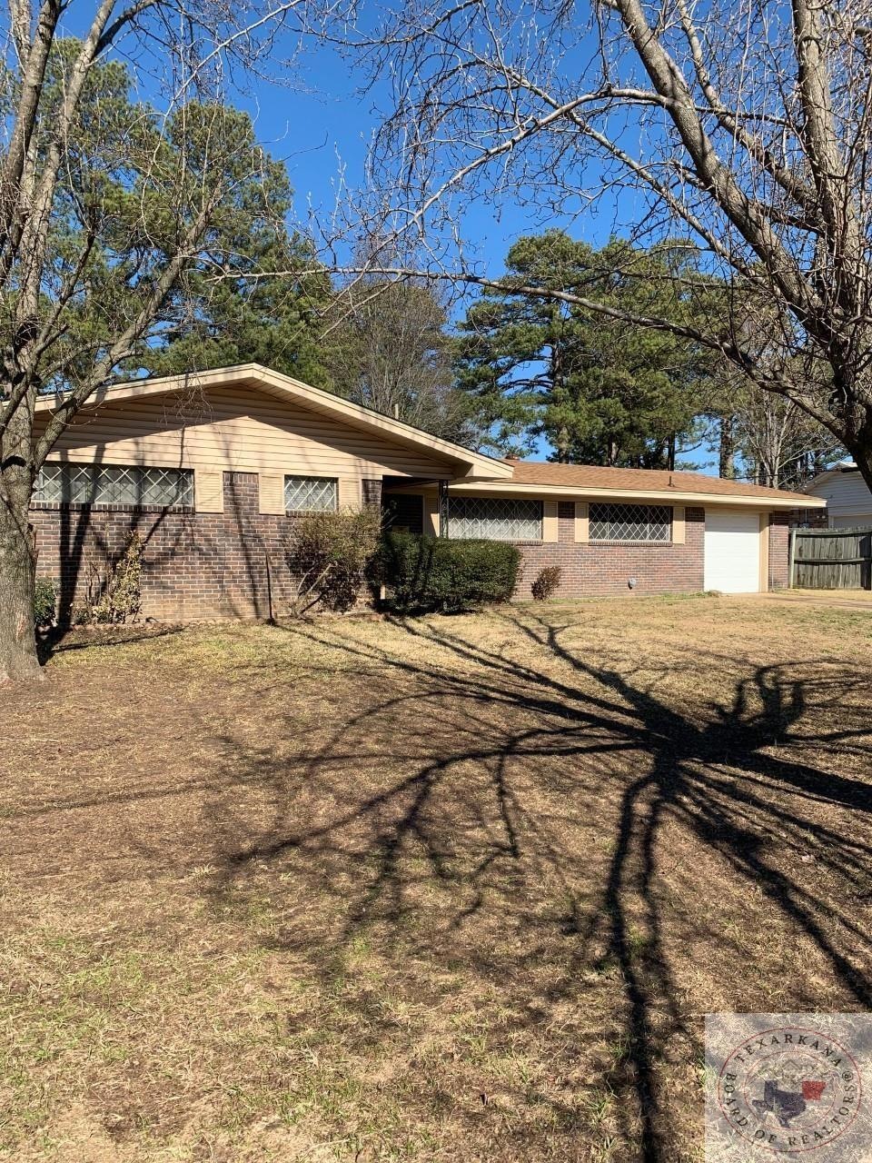 809 Redwater Rd, Wake Village, TX 75501 - photo 1