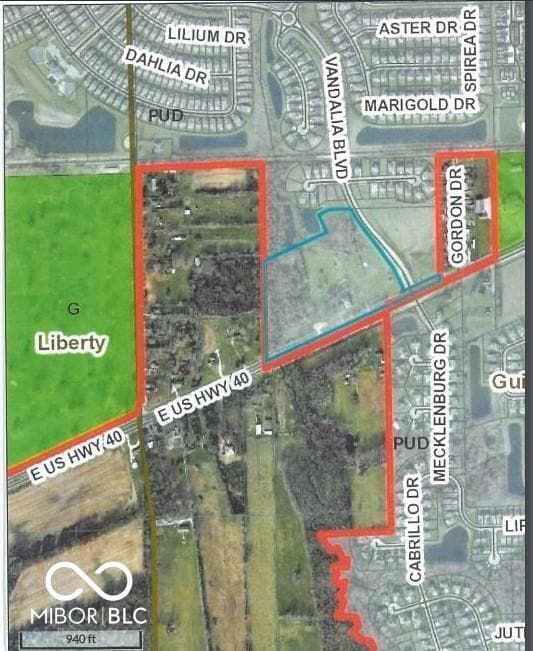 aerial map of property and surrounding area featuring property boundaries highlighted