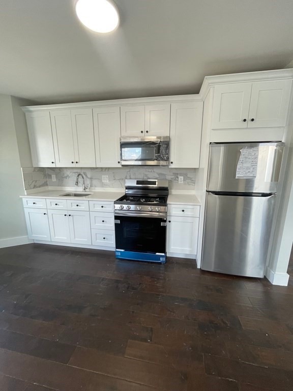 173 E Merrimack St unit 1, Lowell, MA 01852 - photo 1