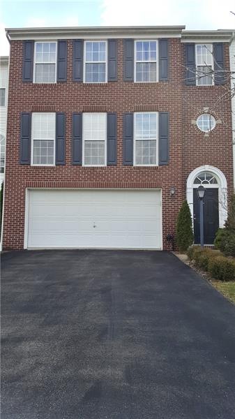 Paved Driveway leads to this lovely townhouse!