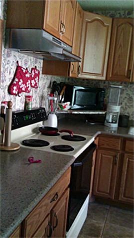 Kitchen with oak cabinets
