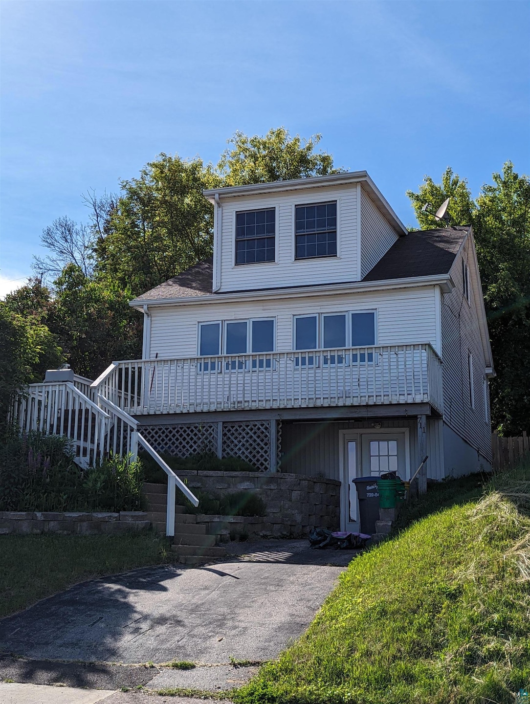 View of front facade with a deck