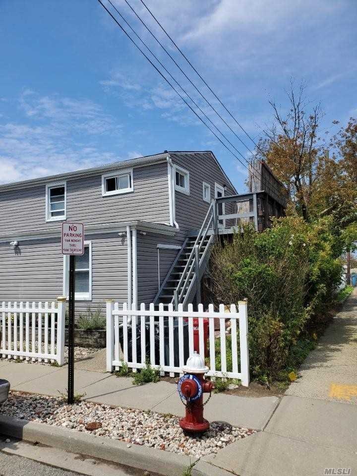 18 Julian Place unit upper, Island Park, NY 11558 - photo 1