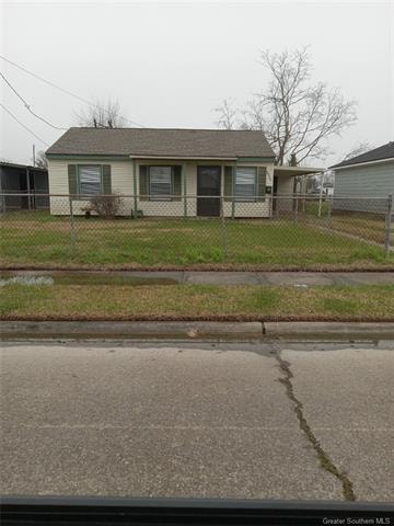 Front of home with covered carport