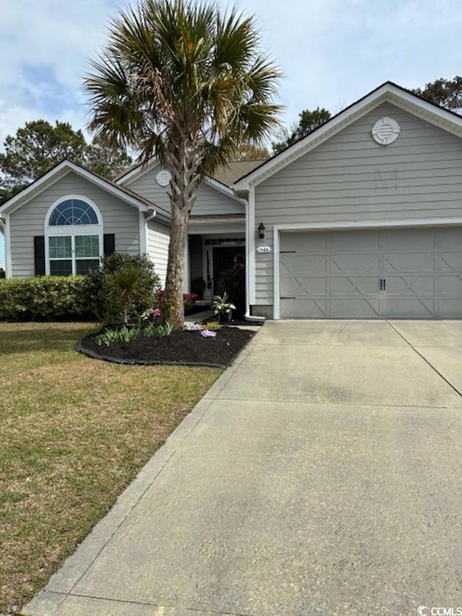 Single story home featuring an attached garage, dr