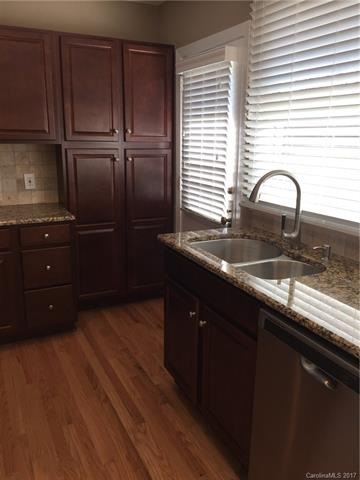 New kitchen with updated cabinets, granite, stainl